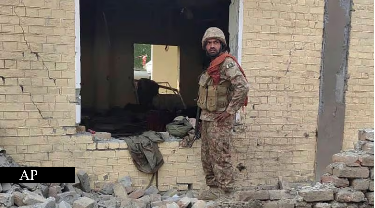 Pak Army soldier at the site of the bombing at the Daraban police station, in Dera Ismail Khan. AP